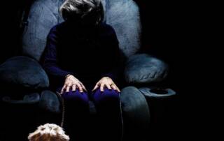 elderly woman sitting alone
